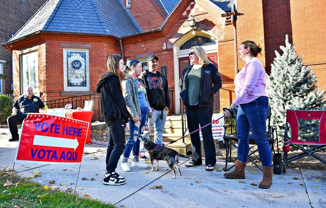From right, Wrightsville Borough Council candidate in Ward 2, Sara Barrett, holding the leash of her 9-year-old dog, Opal, and her best friend Jess Doellinger, of West York Borough, greet voters Jaime Duncan, Abby Duncan and Sophia Shank, 16, during Election Day at their Wrightsville Presbyterian Church polling location in Wrightsville, Tuesday, Nov. 7, 2023. (Dawn J. Sagert/The York Dispatch)