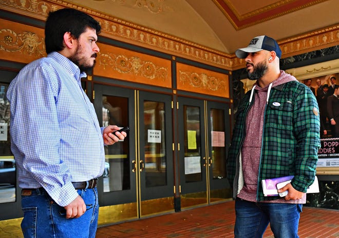 Voter Ricky Quintero, right, of York City, talks to reporter Matt Enright outside of the Appell Center during Election Day in York City, Tuesday, Nov. 7, 2023. (Dawn J. Sagert/The York Dispatch)