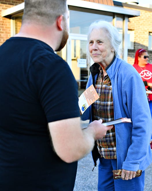 Central York School Board candidate Benjamin Walker, left, greets voter Doris Schnetzka, of Springettsbury Township, at the Commonwealth Fire Co No. 1 Station 893 polling location during Election Day in Springettsbury Township, Tuesday, Nov. 7, 2023. (Dawn J. Sagert/The York Dispatch)