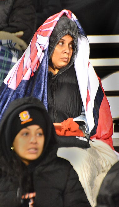 Central York football fans braved the cold by huddling under blankets and extra coats during the Panthers' District 3 Class 6A playoff game against Central Dauphin on Friday, Nov. 10, 2023, in Springettsbury Township. Central York won, 42-34, in a back-and-forth battle.