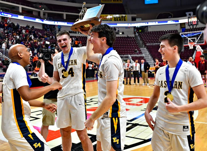 Eastern York celebrates a 55-50 win over Big Spring during District 3, Class 4A boys’ basketball championship action at Giant Center in Hershey, Friday, March 1, 2024. (Dawn J. Sagert/The York Dispatch)