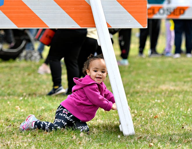 Remi Ajose, 19-months, of West York Borough, is shown following the City of York’s 49th Annual Easter Egg Hunt at Kiwanis Lake in York City, Saturday, March 30, 2024. (Dawn J. Sagert/The York Dispatch)