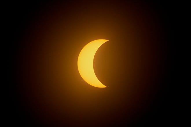 The moon partially covers the sun during a total solar eclipse in Mazatlan, Mexico, Monday, April 8, 2024. (AP Photo/Fernando Llano)