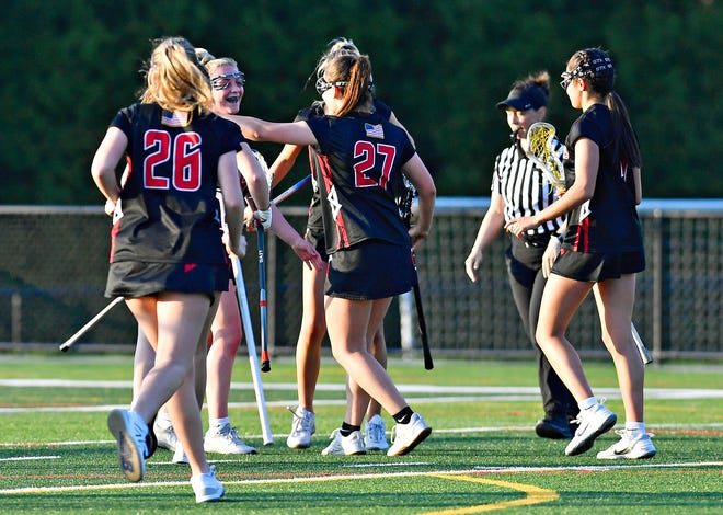 Susquehannock celebrates a score during girls’ lacrosse action at York Catholic High School in York City, Thursday, April 18, 2024. York Catholic would win the game 8-4. (Dawn J. Sagert/The York Dispatch)