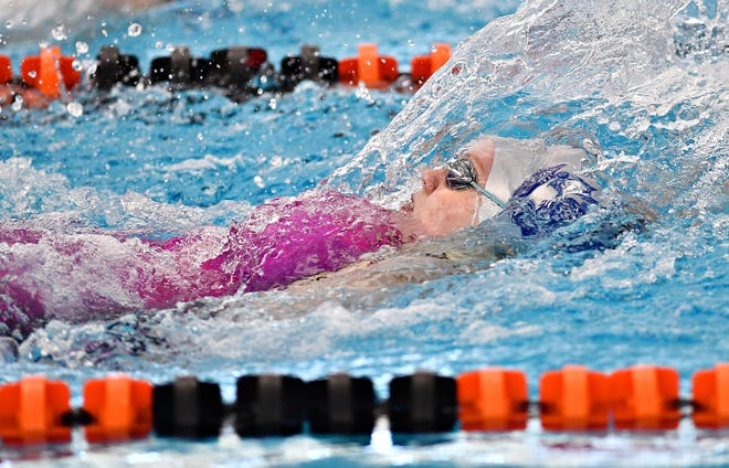 New Oxford's Ashley Myers competes in the 100 Yard Backstroke event during York-Adams League Swimming Championship at Central York High School in Springettsbury Township, Saturday, Feb. 9, 2019. Dawn J. Sagert photo