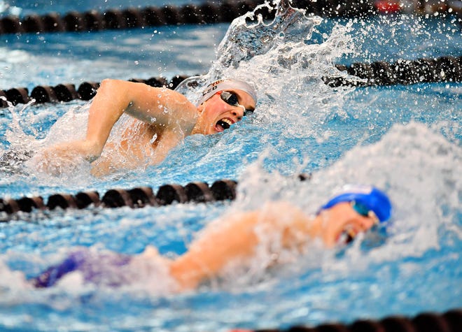 Central York's Cameron Speed, back, and Spring Grove's Daniel Gordon compete in the 400 Yard Freestyle Relay event during the York-Adams League Swimming Championship at Central York High School in Springettsbury Township, Saturday, Feb. 9, 2019. Dawn J. Sagert photo
