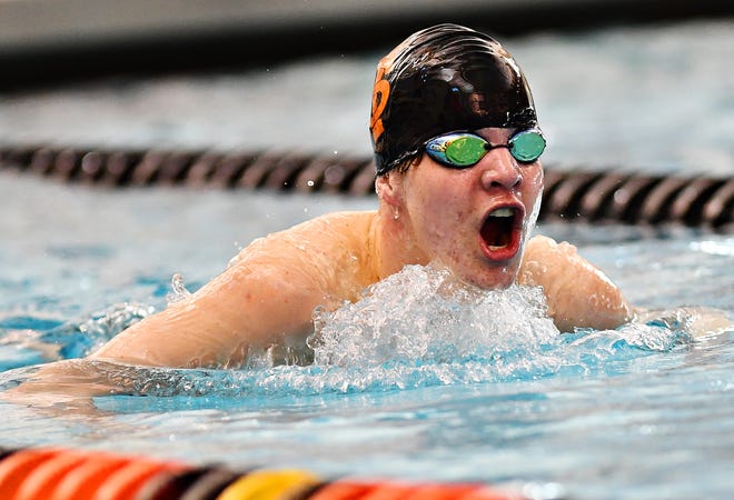 York Suburban's Tyler Herink competes in the 100 Yard Breaststroke event during the York-Adams League Swimming Championship at Central York High School in Springettsbury Township, Saturday, Feb. 9, 2019. Dawn J. Sagert photo