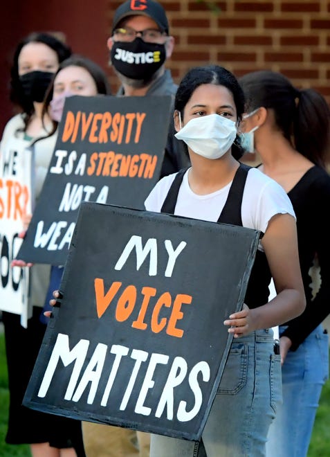 Organizer and Central York High School student Edha Gupta holds a sign during a protest of the school's ban on books and other teaching materials by black and Hispanic authors during a rally outside the school Wednesday, Sept. 8, 2021. The Panther Anti-Racist Union–a student organization–organized the protest which they say will occur daily until Sept. 13, the date of the next district school board meeting. Bill Kalina photo