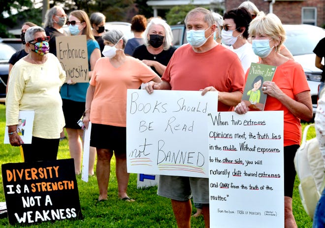 Demonstrators rally outside the Central York School District Administration offices before a school board meeting there Monday, Sept. 13, 2021. The rally was in opposition to a banned resource list instituted by the district, which demonstrators say targets minority authors. Bill Kalina photo