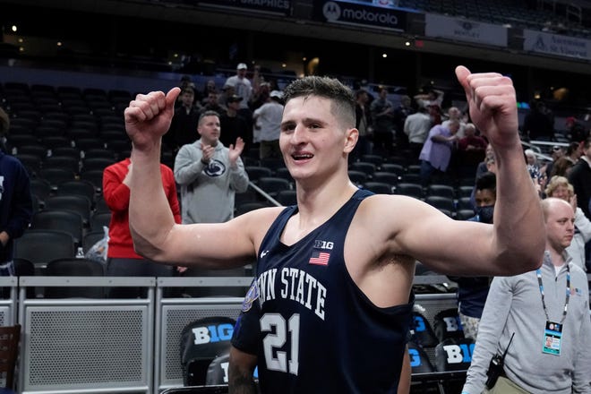 Penn State's John Harrar reacts after Penn State defeated Ohio State an NCAA college basketball game at the Big Ten Conference tournament, Thursday, March 10, 2022, in Indianapolis. (AP Photo/Darron Cummings)