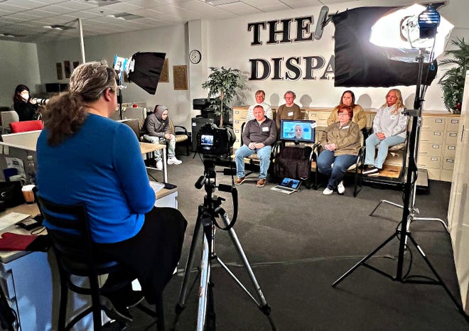 Tyree Bowie joins jurors and alternate jurors in a discussion of the trial with reporter Aimee Ambrose, front left, at The York Dispatch in West Manchester Township, Saturday, Jan. 7, 2023. Dawn J. Sagert photo
