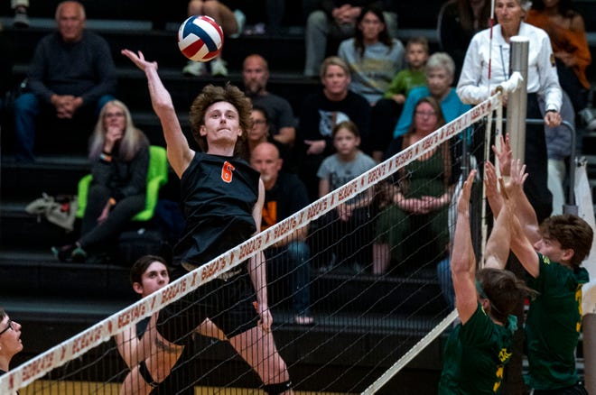 Northeastern's Ethan Schick (6) against York Catholic during their boys volleyball match in Manchester on Thursday, Apr. 27, 2023.